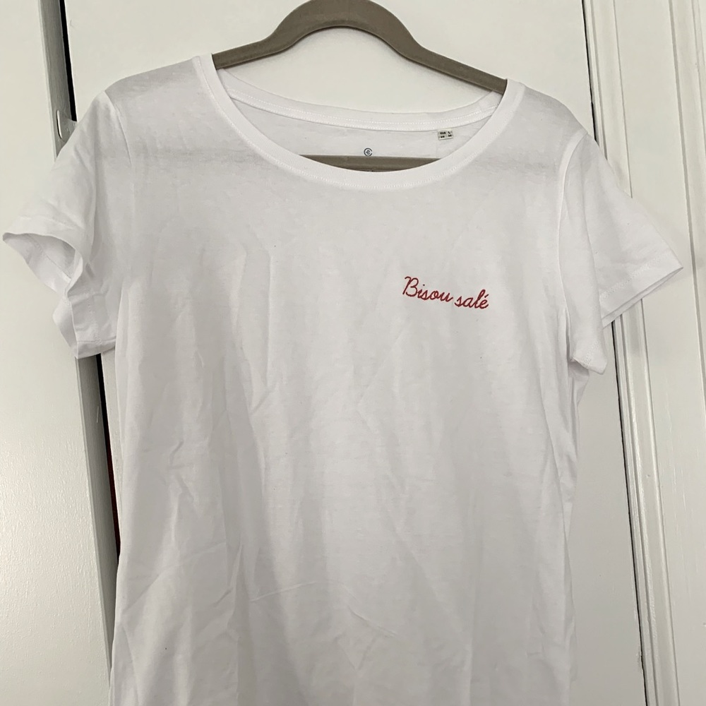 French T with red embroidered inscription